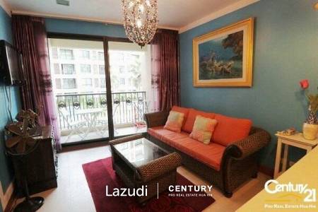 1 Bed Condo with Pool View in Town