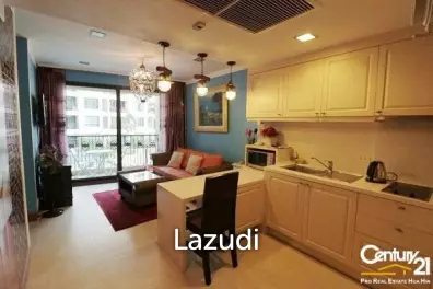 1 Bed Condo with Pool View in Town