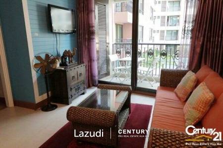 1 Bed Condo with Pool View in Town