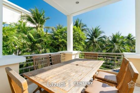 BLUE LAGOON : Well presented 2nd floor 2 bed condo overlooking large swimming pool lagoon.