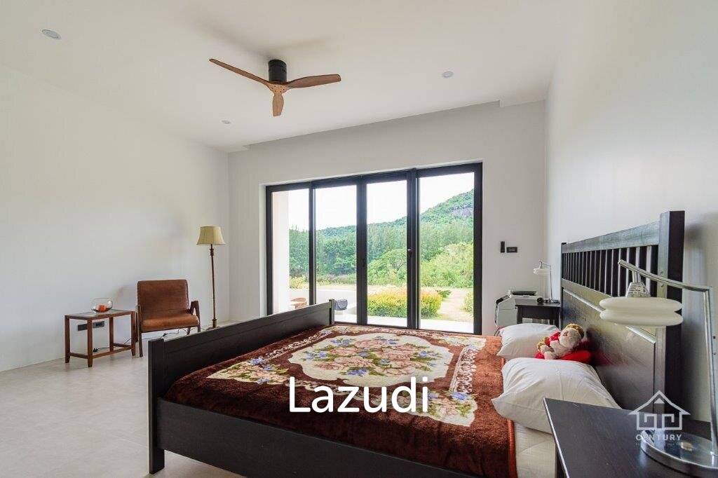 Outstanding Modern Lakeside 3 bed pool villa with 1 bed guesthouse and Maids Quarters near Black Mountain Golf Course.