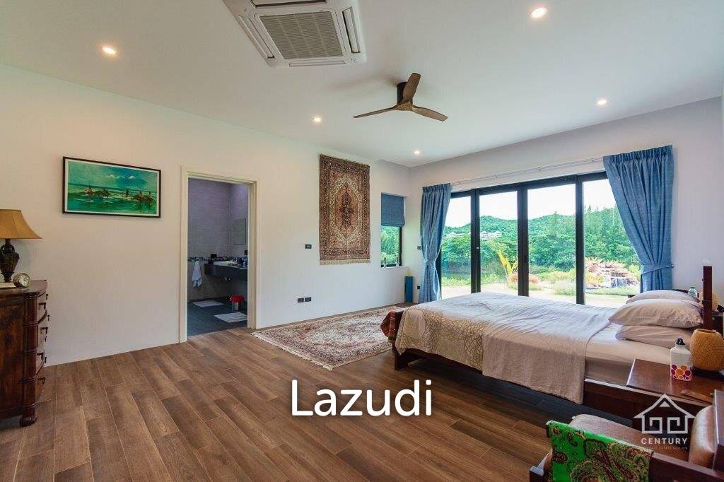 Outstanding Modern Lakeside 3 bed pool villa with 1 bed guesthouse and Maids Quarters near Black Mountain Golf Course.