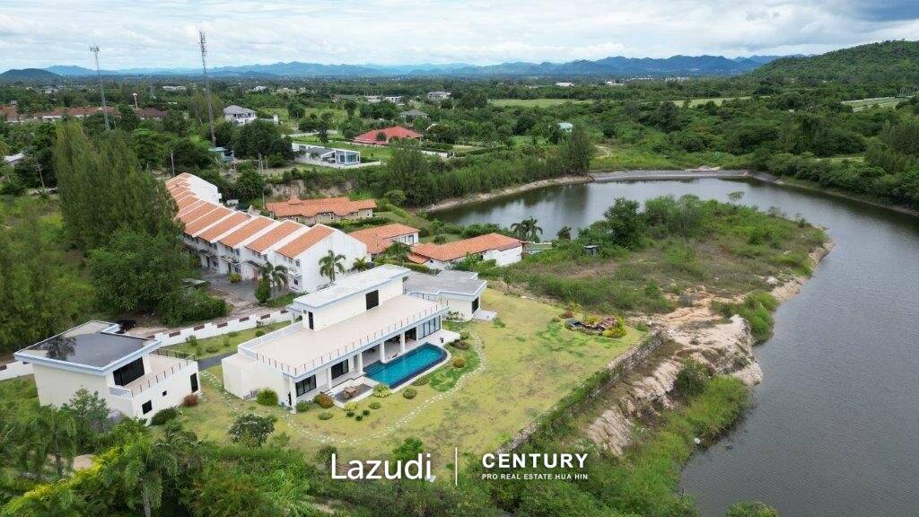 Outstanding Modern Lakeside 3 bed pool villa with 1 bed guesthouse and Maids Quarters near Black Mountain Golf Course.