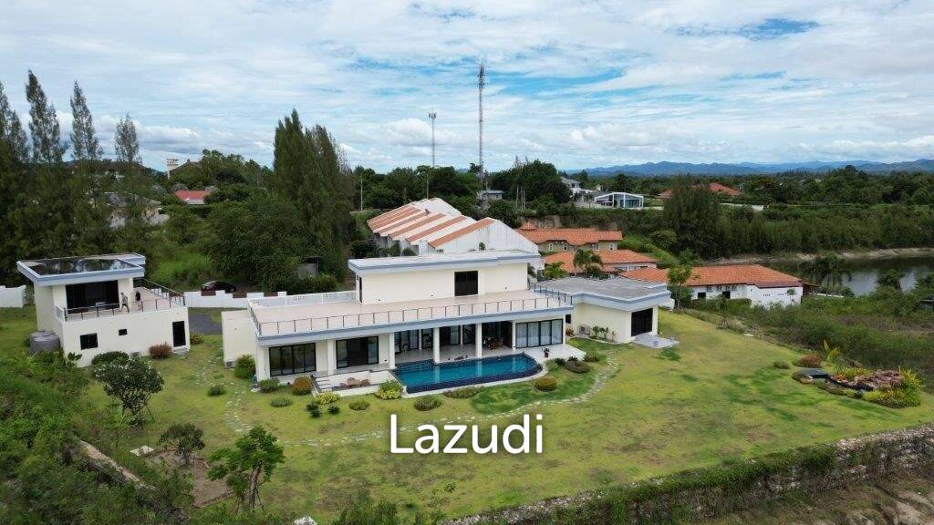 Outstanding Modern Lakeside 3 bed pool villa with 1 bed guesthouse and Maids Quarters near Black Mountain Golf Course.