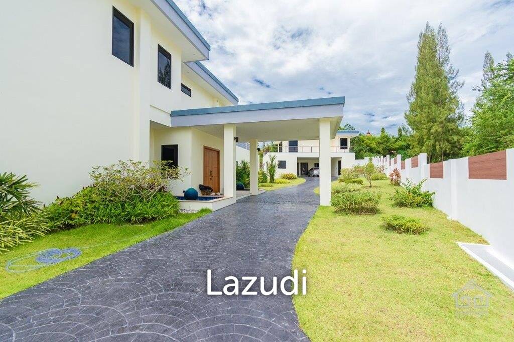 Outstanding Modern Lakeside 3 bed pool villa with 1 bed guesthouse and Maids Quarters near Black Mountain Golf Course.