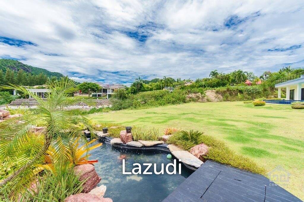 Outstanding Modern Lakeside 3 bed pool villa with 1 bed guesthouse and Maids Quarters near Black Mountain Golf Course.