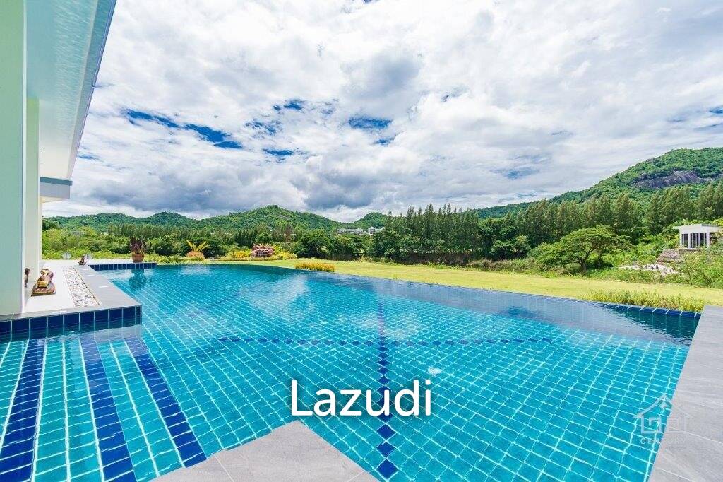 Outstanding Modern Lakeside 3 bed pool villa with 1 bed guesthouse and Maids Quarters near Black Mountain Golf Course.