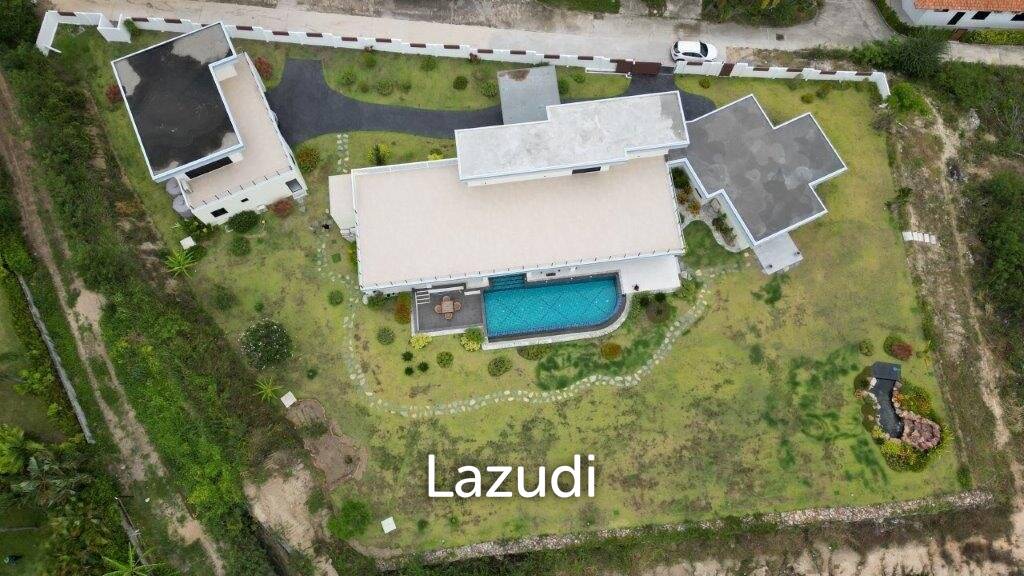 Outstanding Modern Lakeside 3 bed pool villa with 1 bed guesthouse and Maids Quarters near Black Mountain Golf Course.