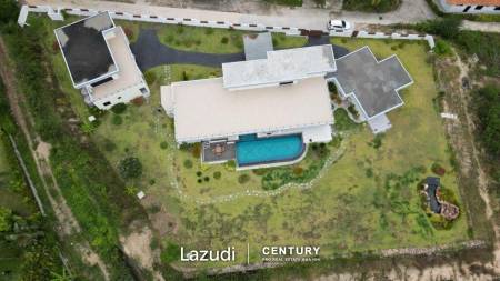 Outstanding Modern Lakeside 3 bed pool villa with 1 bed guesthouse and Maids Quarters near Black Mountain Golf Course.