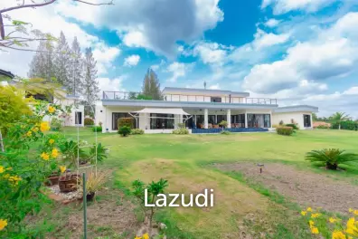Outstanding Modern Lakeside 3 bed pool villa with 1 bed guesthouse and Maids Quarters near Black Mountain Golf Course.