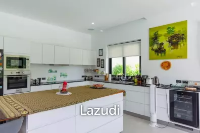 Outstanding Modern Lakeside 3 bed pool villa with 1 bed guesthouse and Maids Quarters near Black Mountain Golf Course.