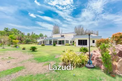 Outstanding Modern Lakeside 3 bed pool villa with 1 bed guesthouse and Maids Quarters near Black Mountain Golf Course.