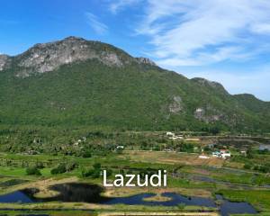 25 rai beautifully landscaped land by Dolphin Bay