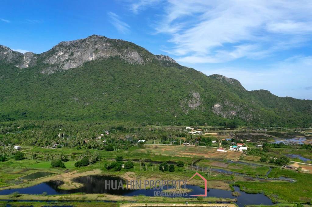 25 rai beautifully landscaped land by Dolphin Bay