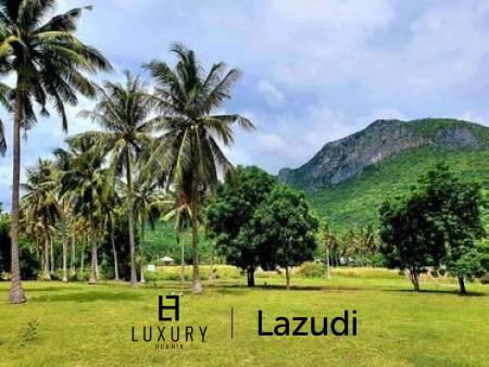 25 rai beautifully landscaped land by Dolphin Bay