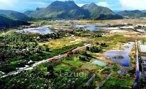 25 rai beautifully landscaped land by Dolphin Bay