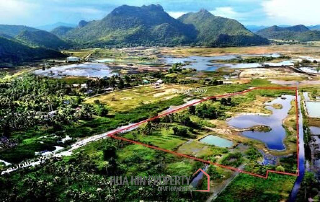 25 rai beautifully landscaped land by Dolphin Bay