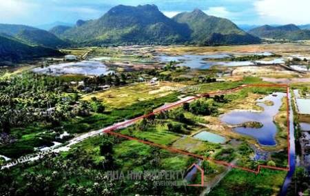 25 rai beautifully landscaped land by Dolphin Bay