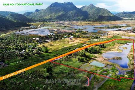25 rai beautifully landscaped land by Dolphin Bay